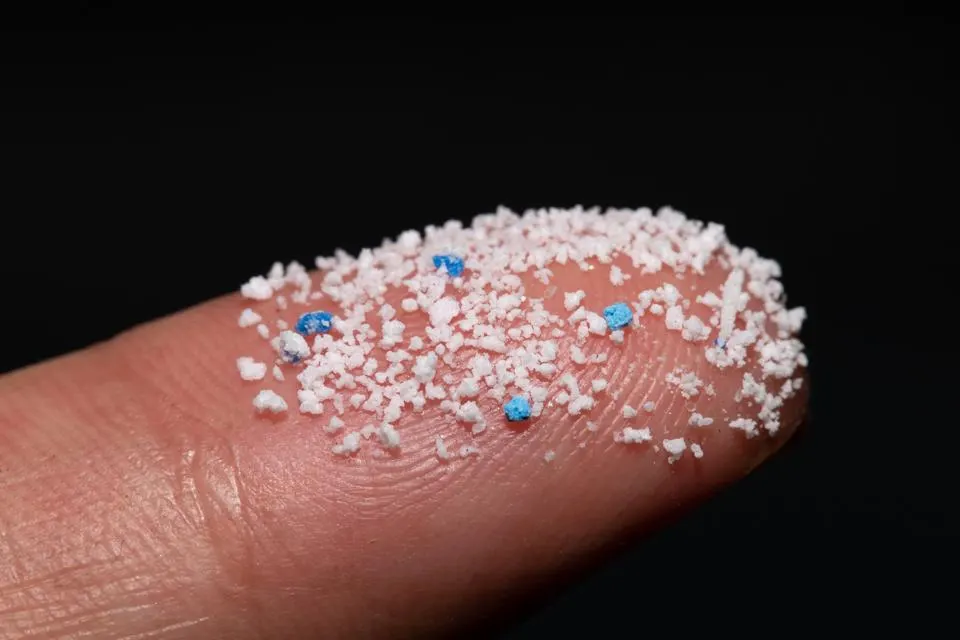 microplastics on a finger